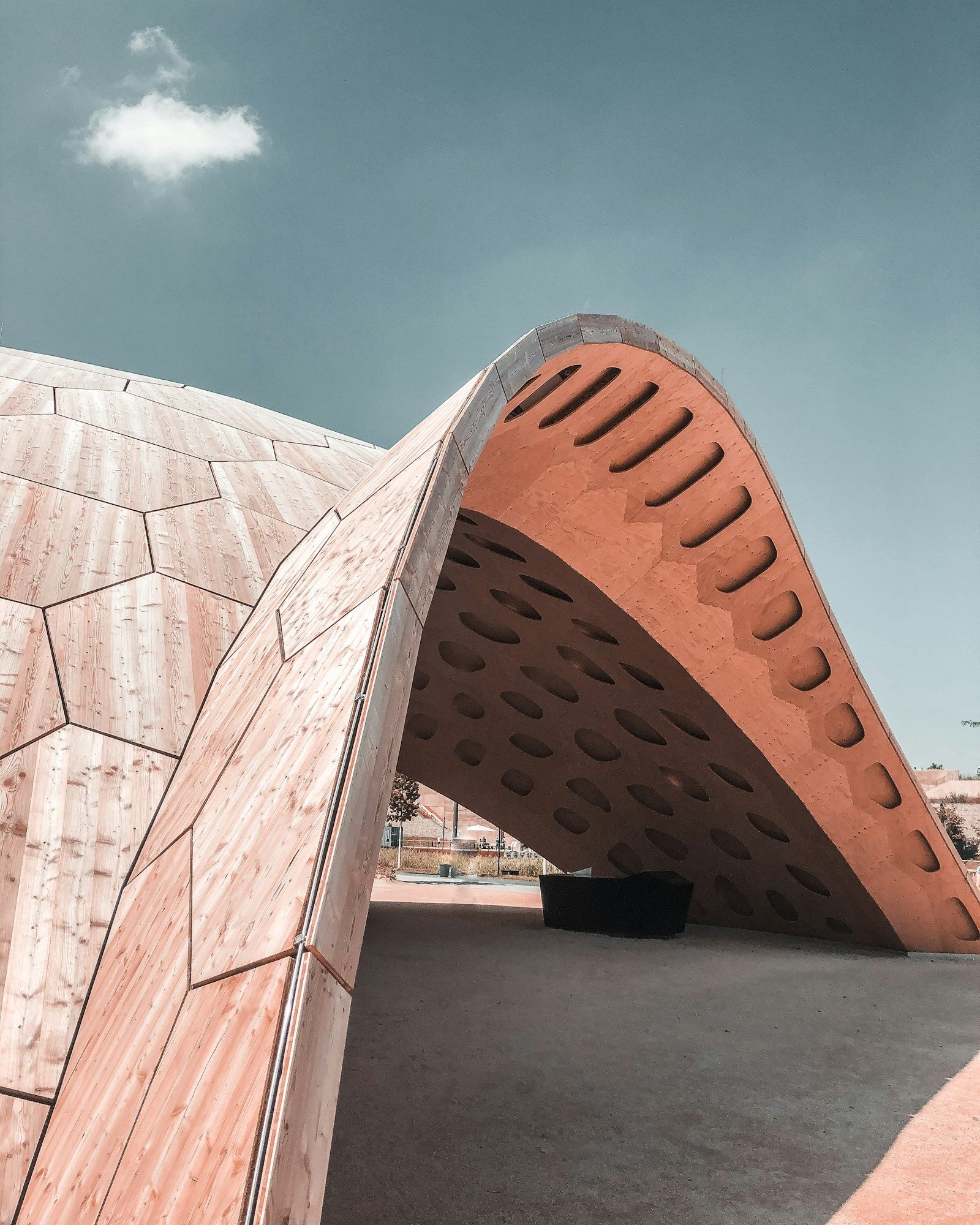 Sculptural concrete structure with geometric shadows